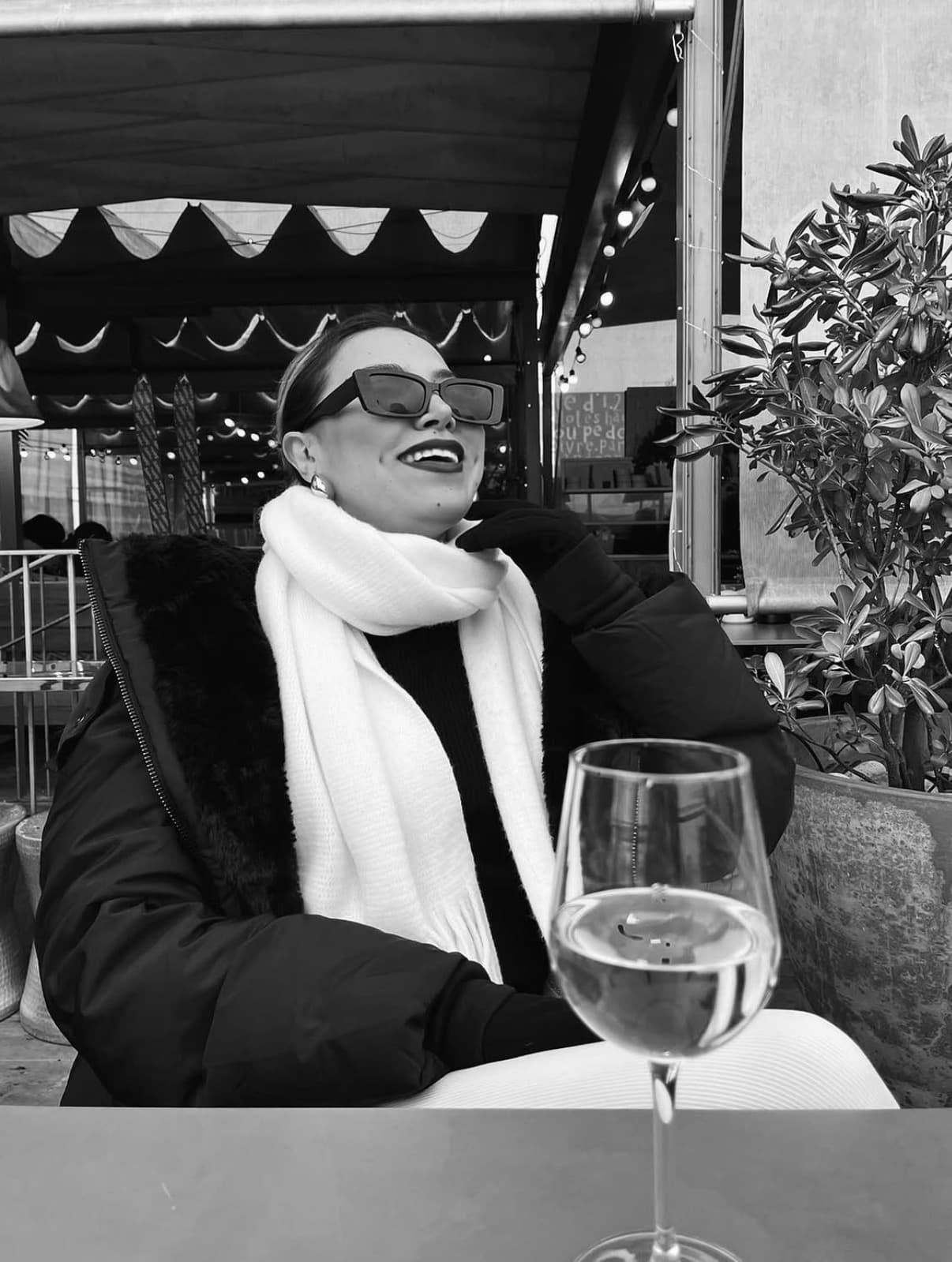 Founder in a monochrome café portrait