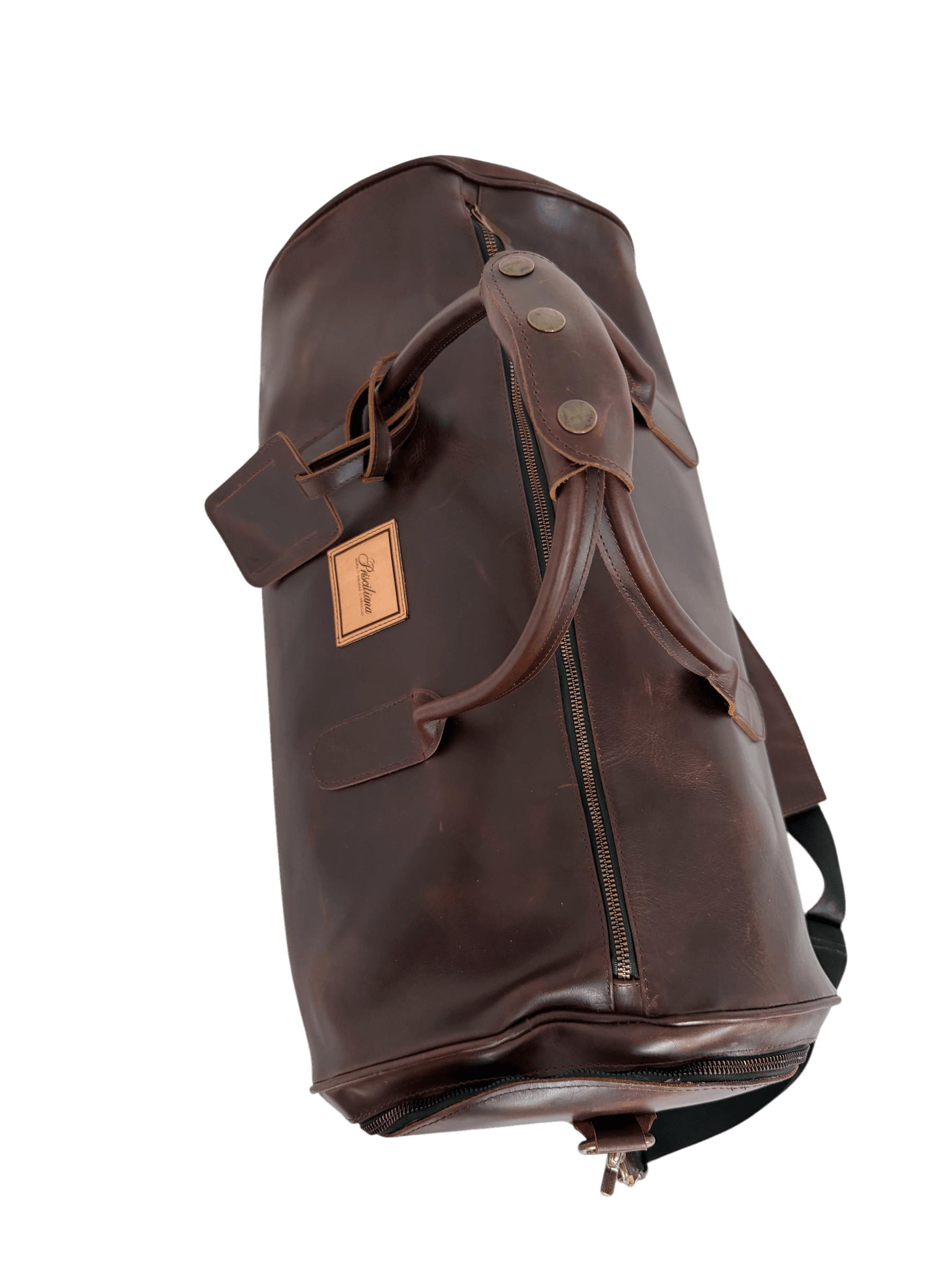 La Herencia Carryall in burgundy leather, right side studio view