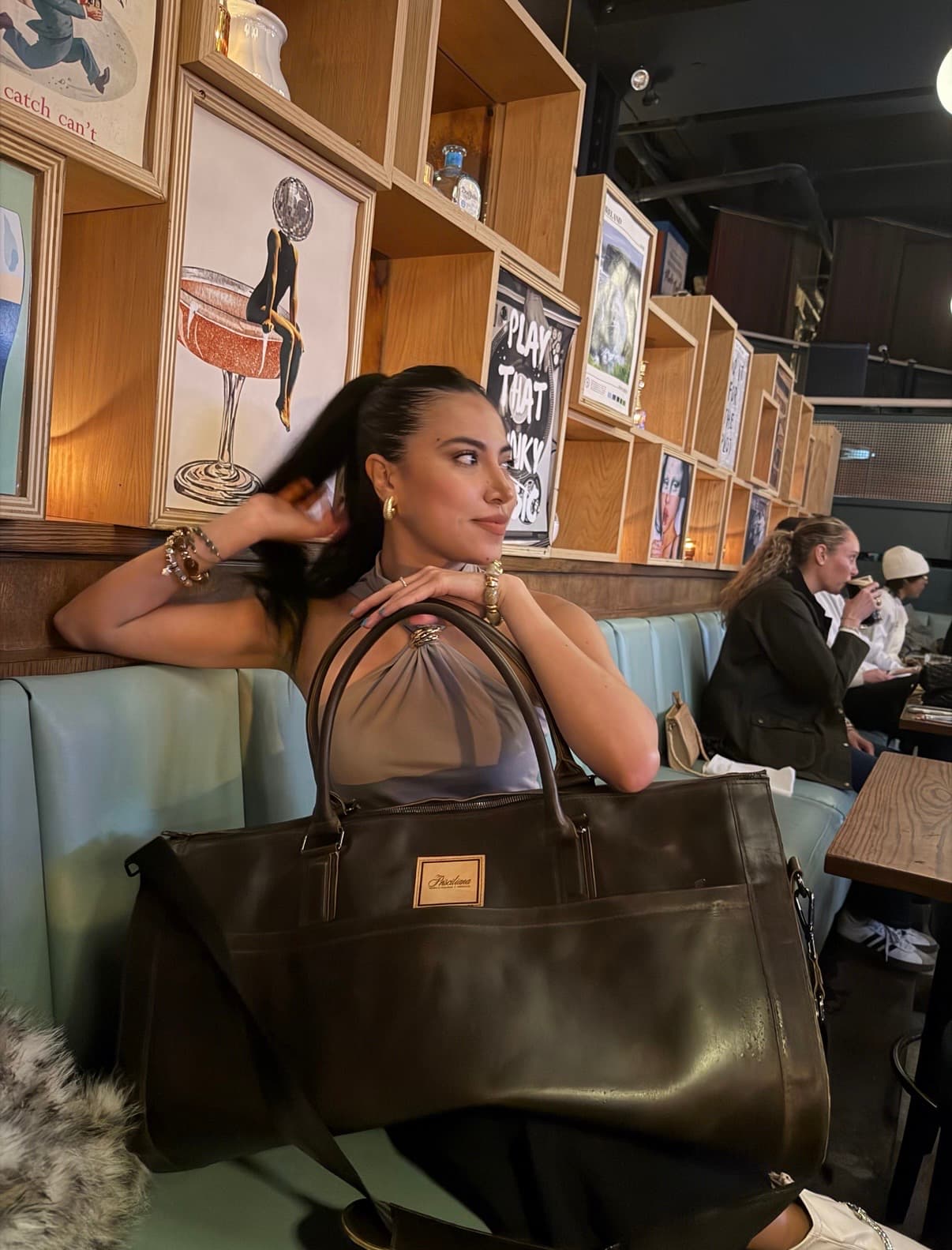 Founder with La Abuela Weekender in burgundy leather